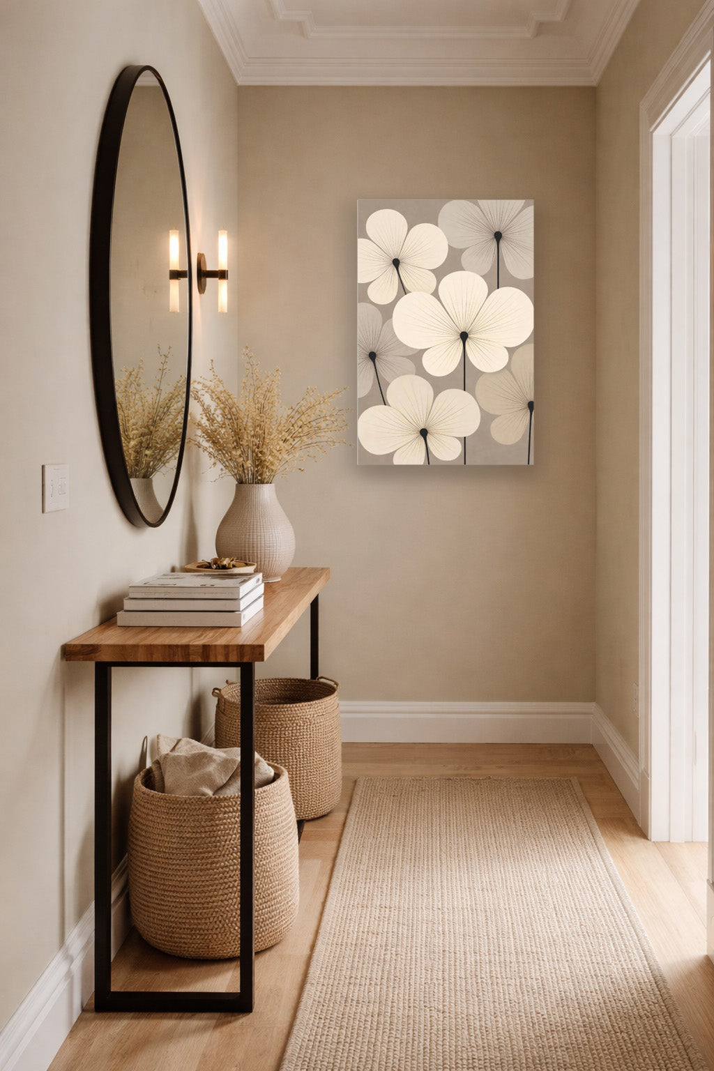 Modern entryway interior with neutral floral canvas wall art, wooden console table and woven decor baskets.