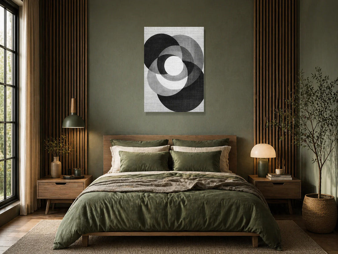 Black and white abstract canvas print on dark green wall in minimalist Japandi bedroom with wood accents