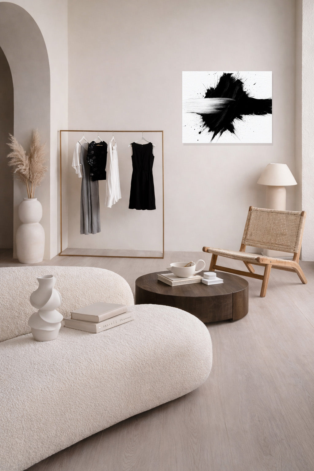 Abstract black and white framed wall art in neutral modern interior with soft minimalist styling