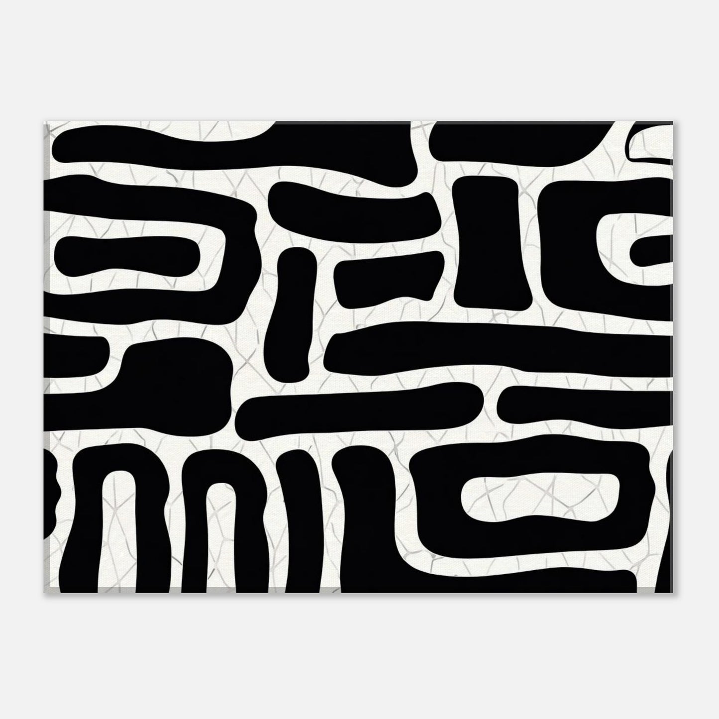 Abstract black and white wall art shown from an angled perspective highlighting modern design