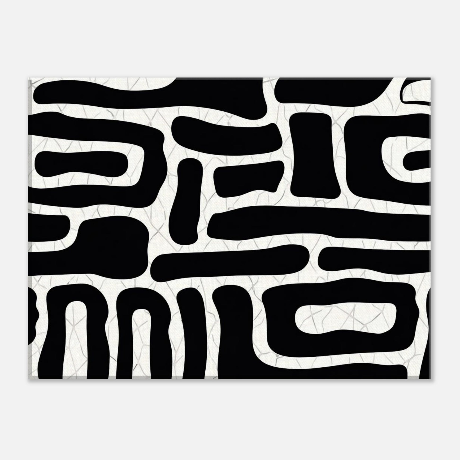 Abstract black and white wall art shown from an angled perspective highlighting modern design