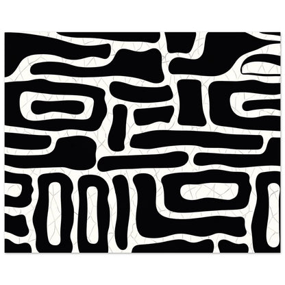 Close view of the rounded black shapes and the narrow white channels between them
