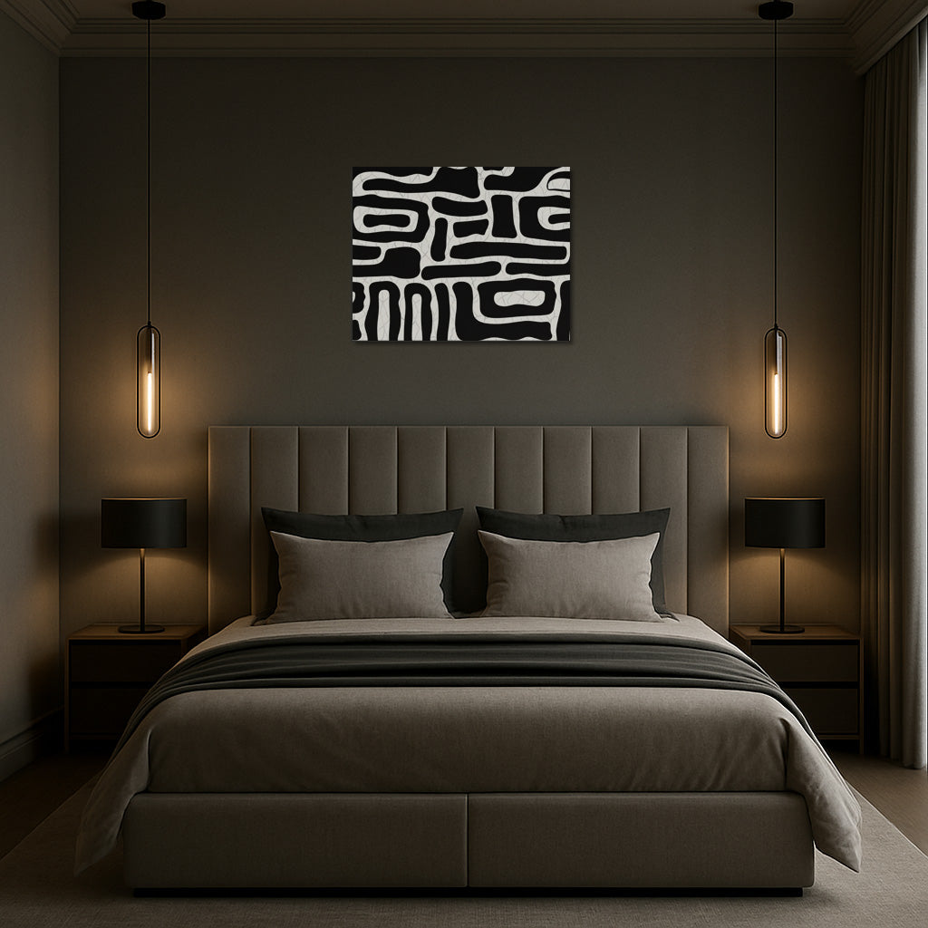 Modern abstract black and white wall art styled in a contemporary living room interior