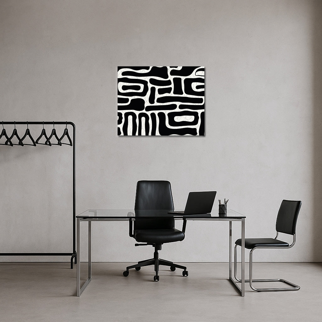 Modern black and white abstract canva styled above a home office desk