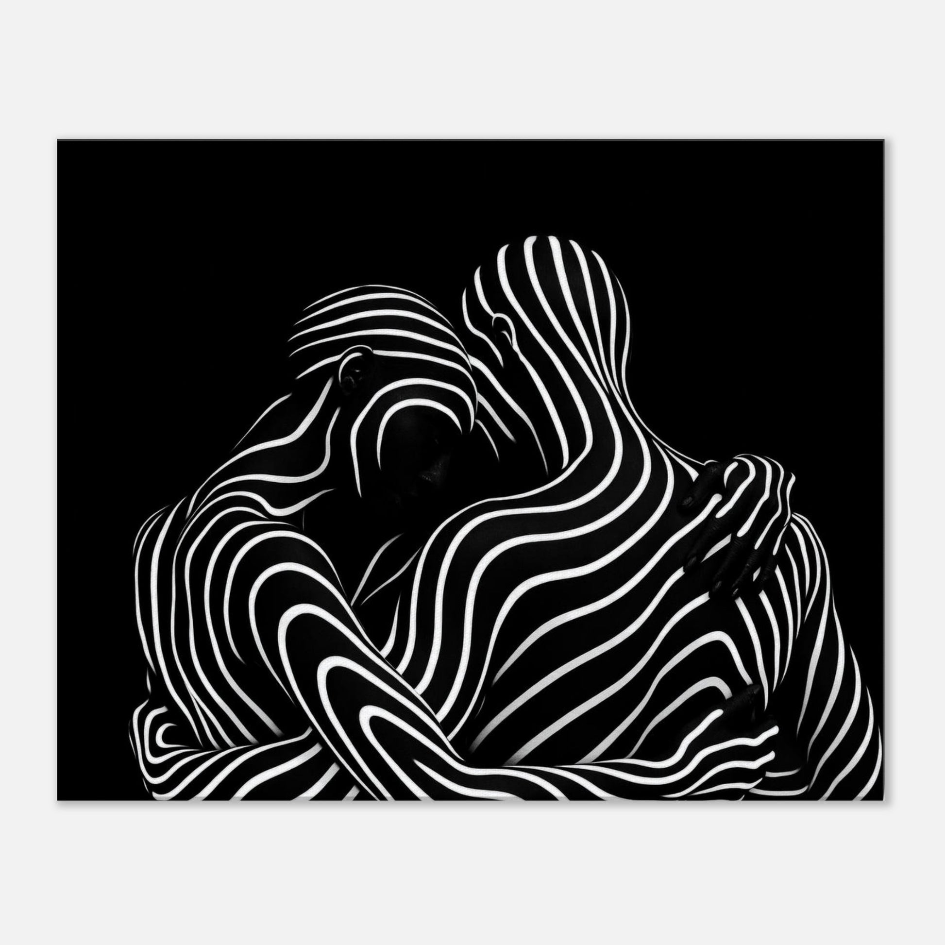 Black and white abstract canvas wall art featuring intertwined human figures in minimalist line art style