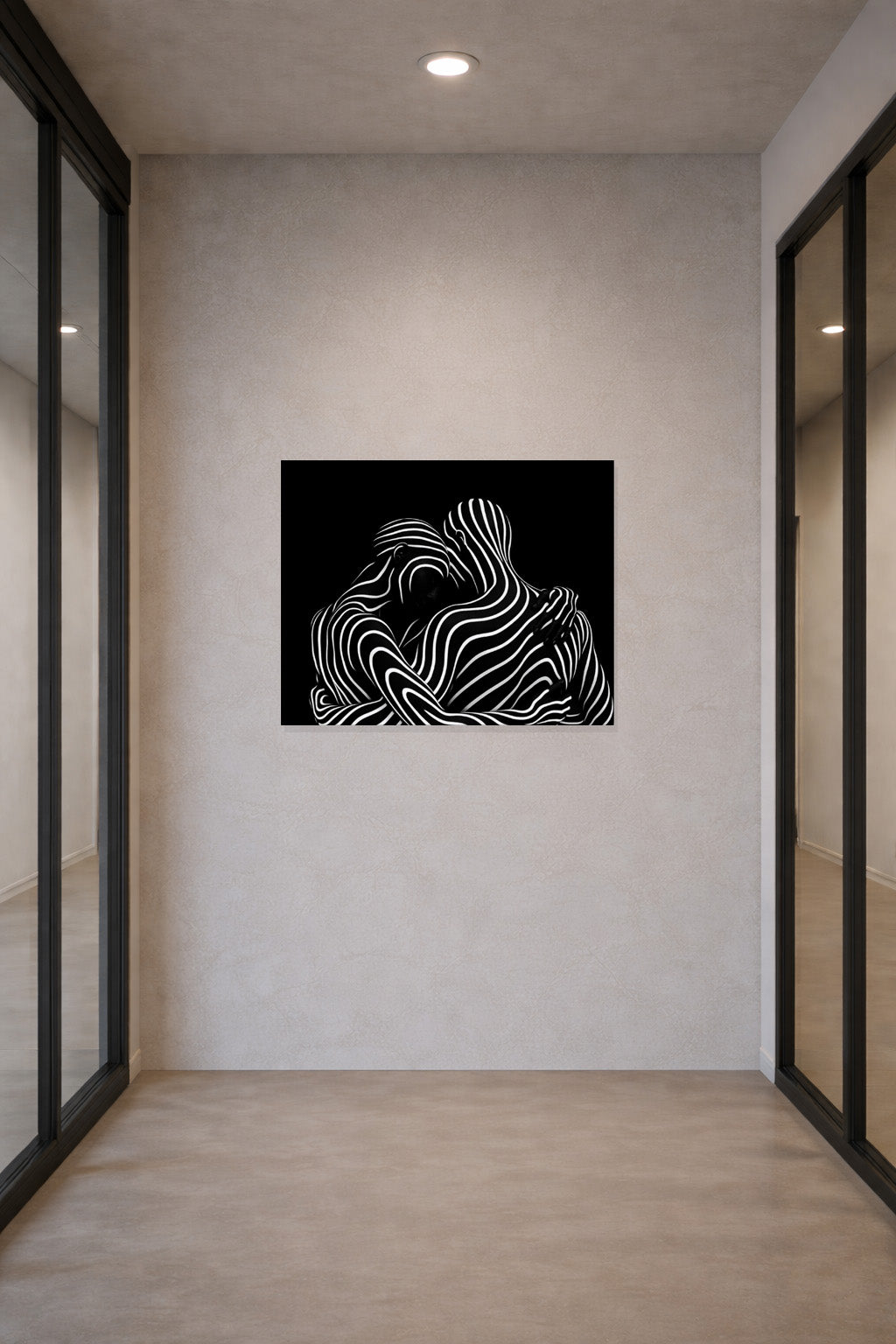 Black and white abstract canvas wall art displayed in a modern hallway interior