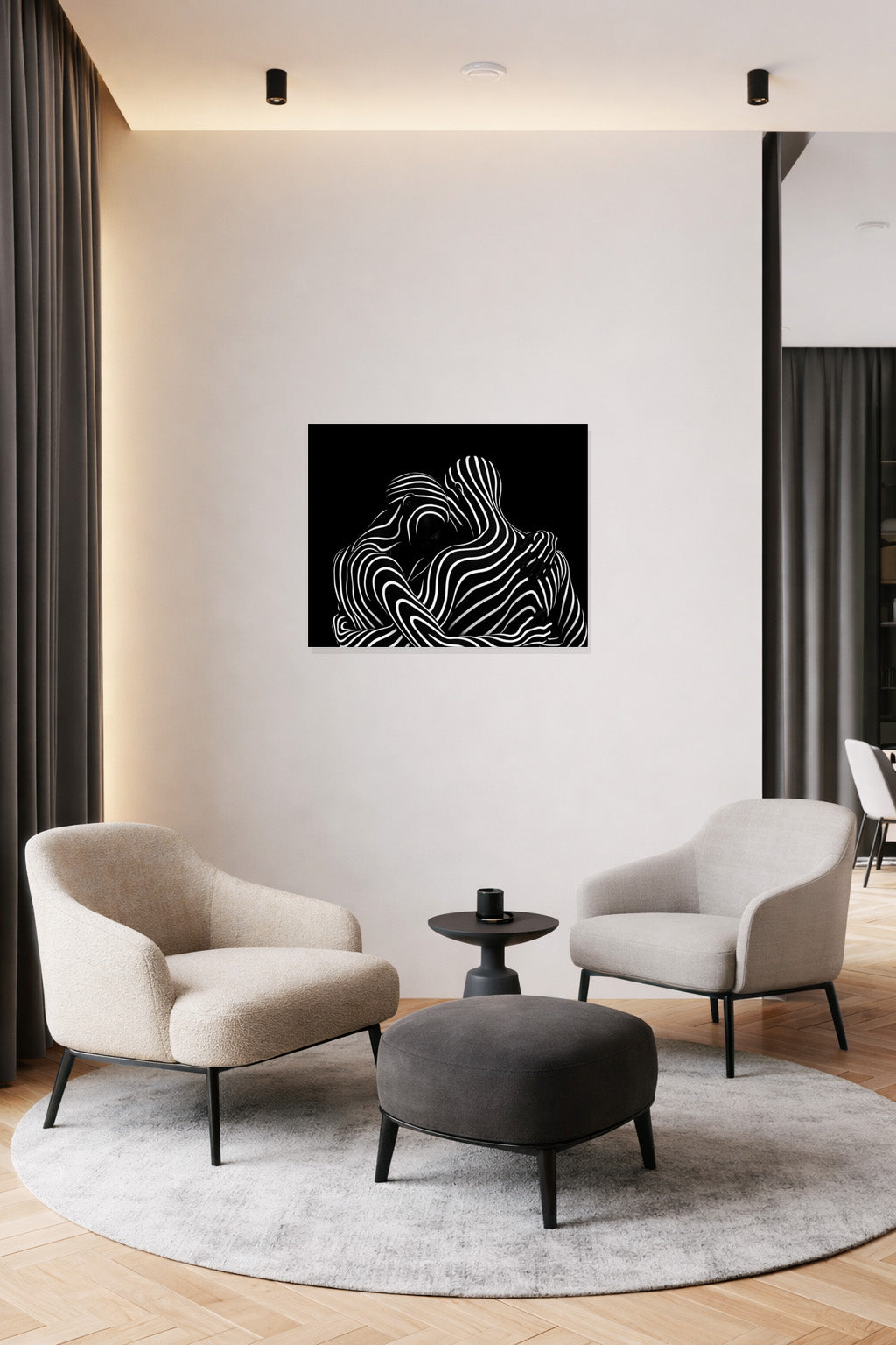 Black and white abstract canvas art displayed in a contemporary minimalist living room