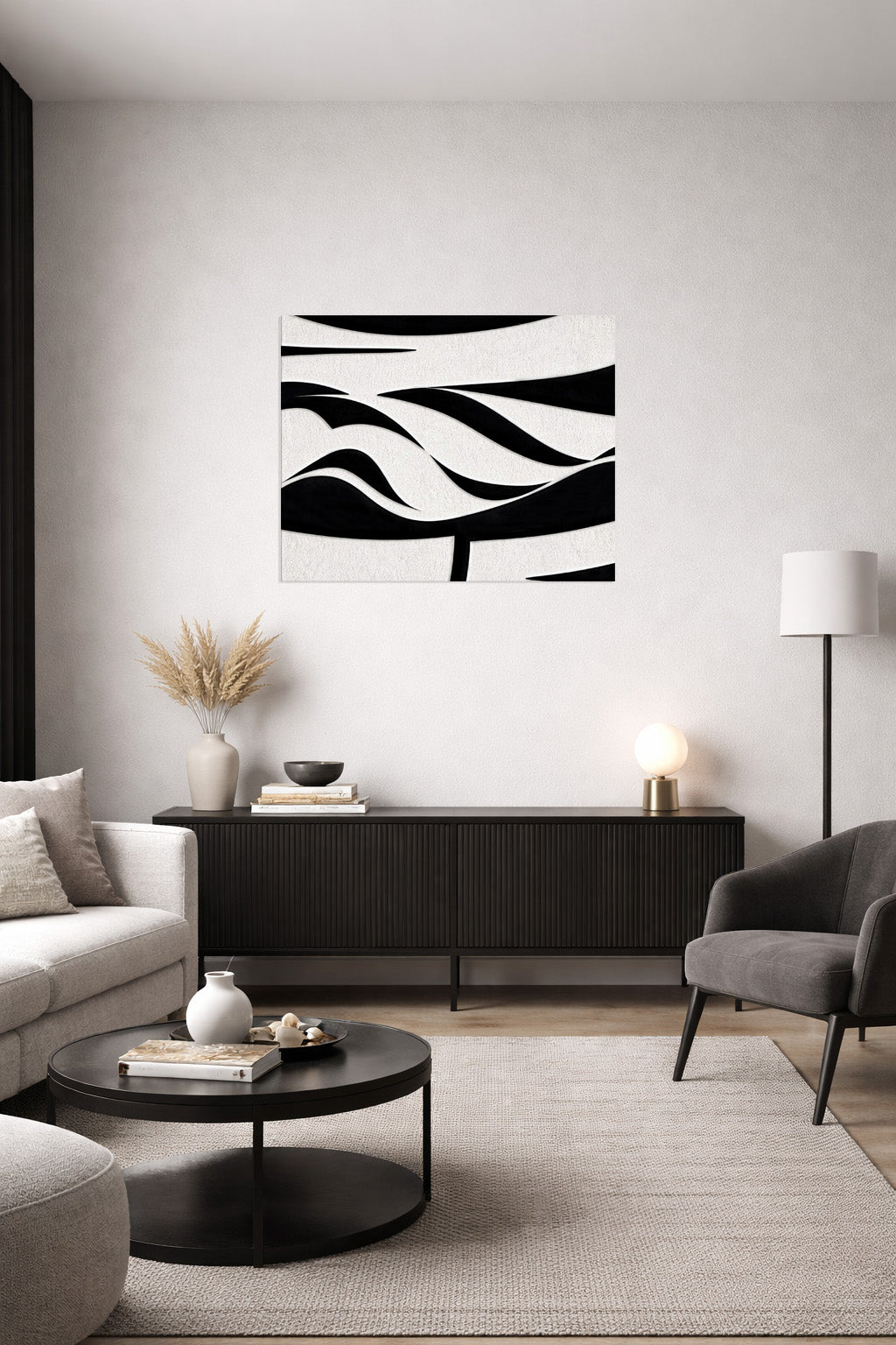 Abstract black and white wall art in a contemporary minimalist interior