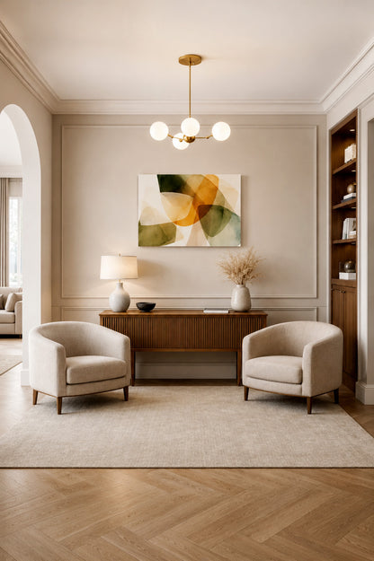 Modern neutral living room with abstract canvas wall art and beige armchairs