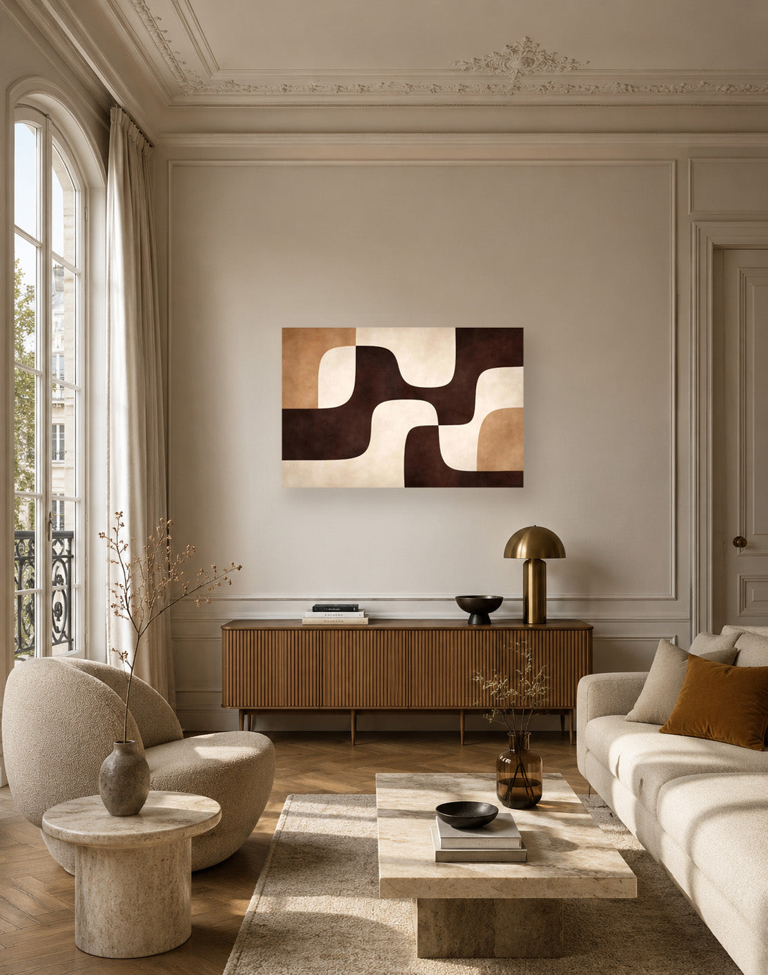 Elegant living room with cream furniture and abstract wall art poster in warm neutrals