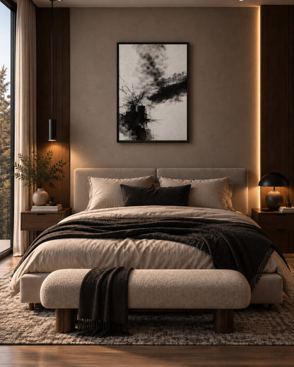Black and white abstract artwork above a bed in a warm contemporary bedroom