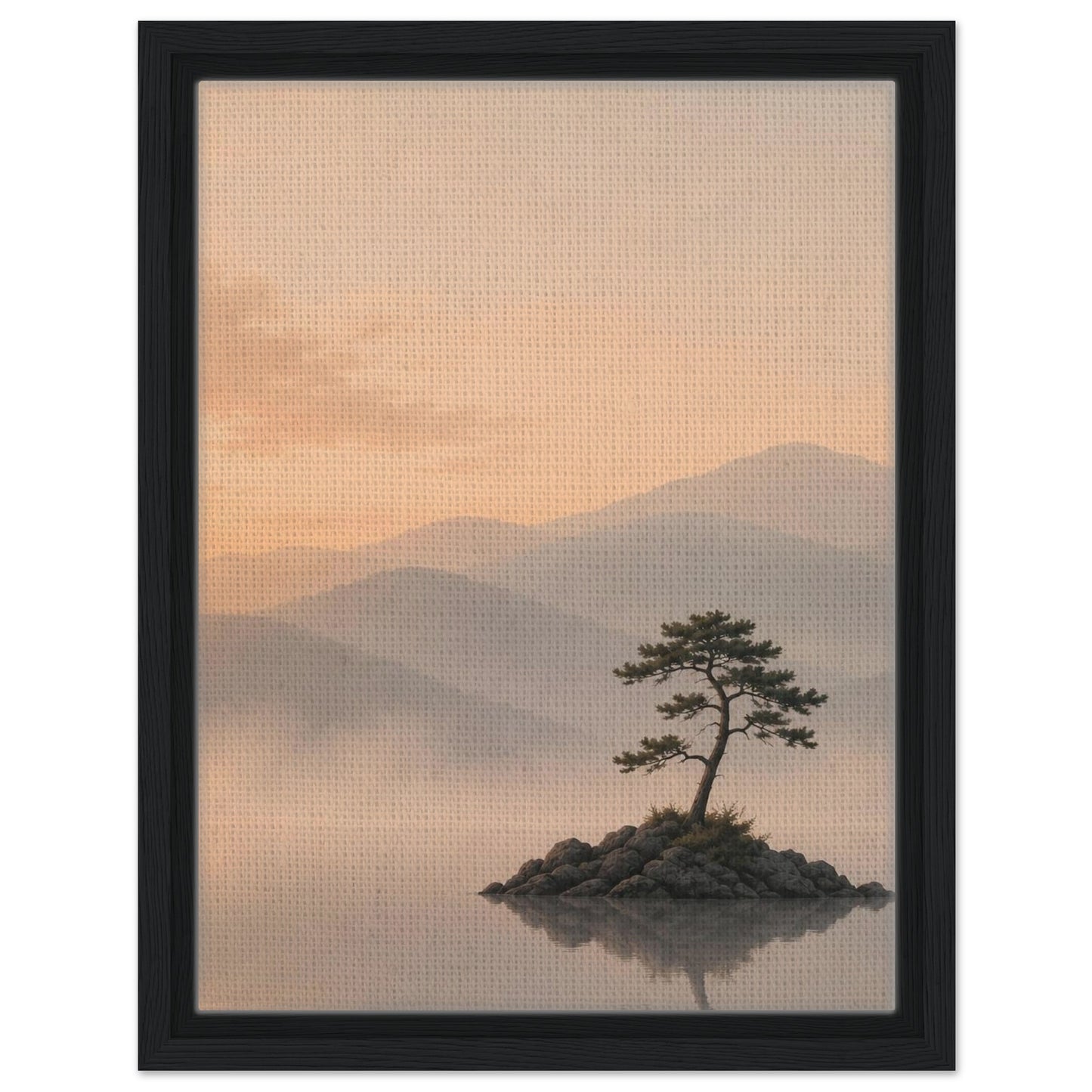 Calming mountain landscape with pine tree island reflected in still water in black frame