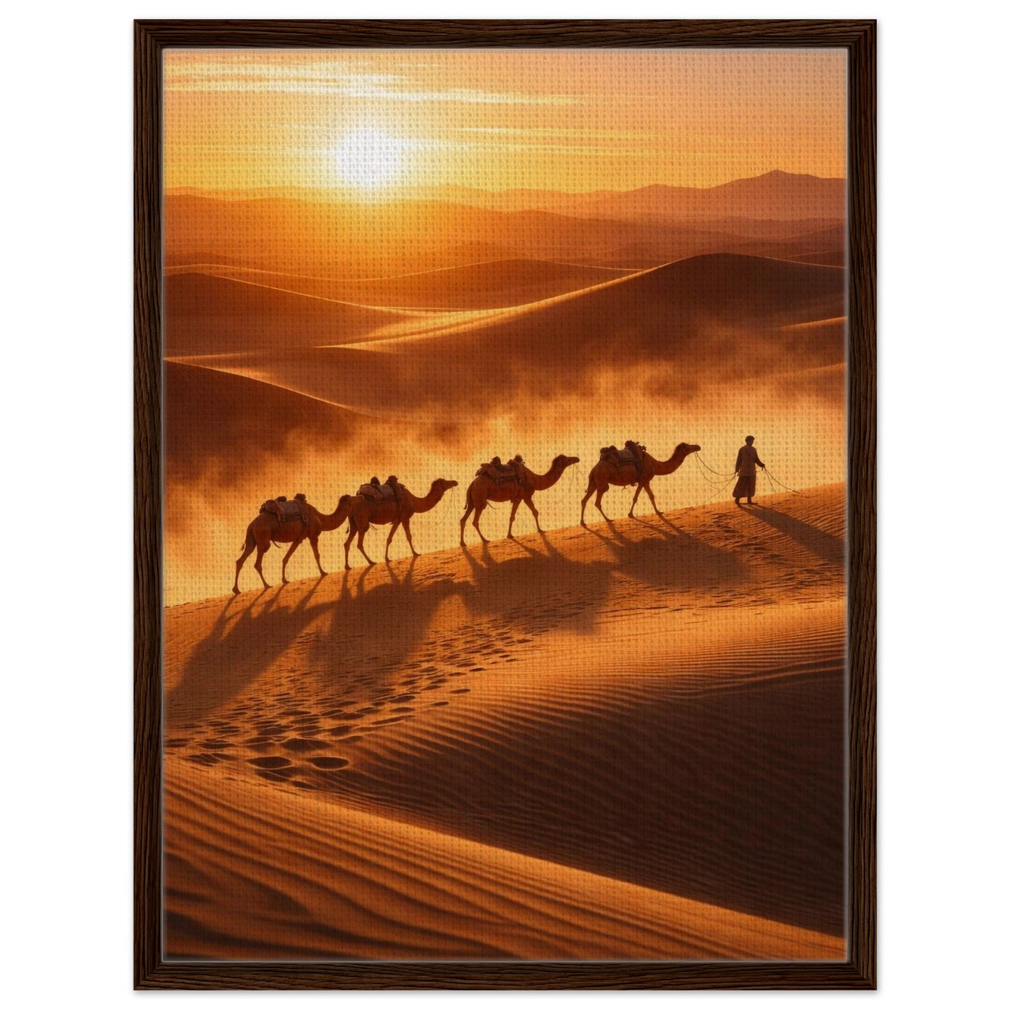Camel caravan desert landscape canvas print presented in a warm brown wood frame
