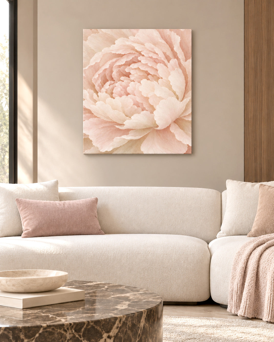 Ivory Peony canvas above a cream bouclé sofa with blush cushions in a serene living room