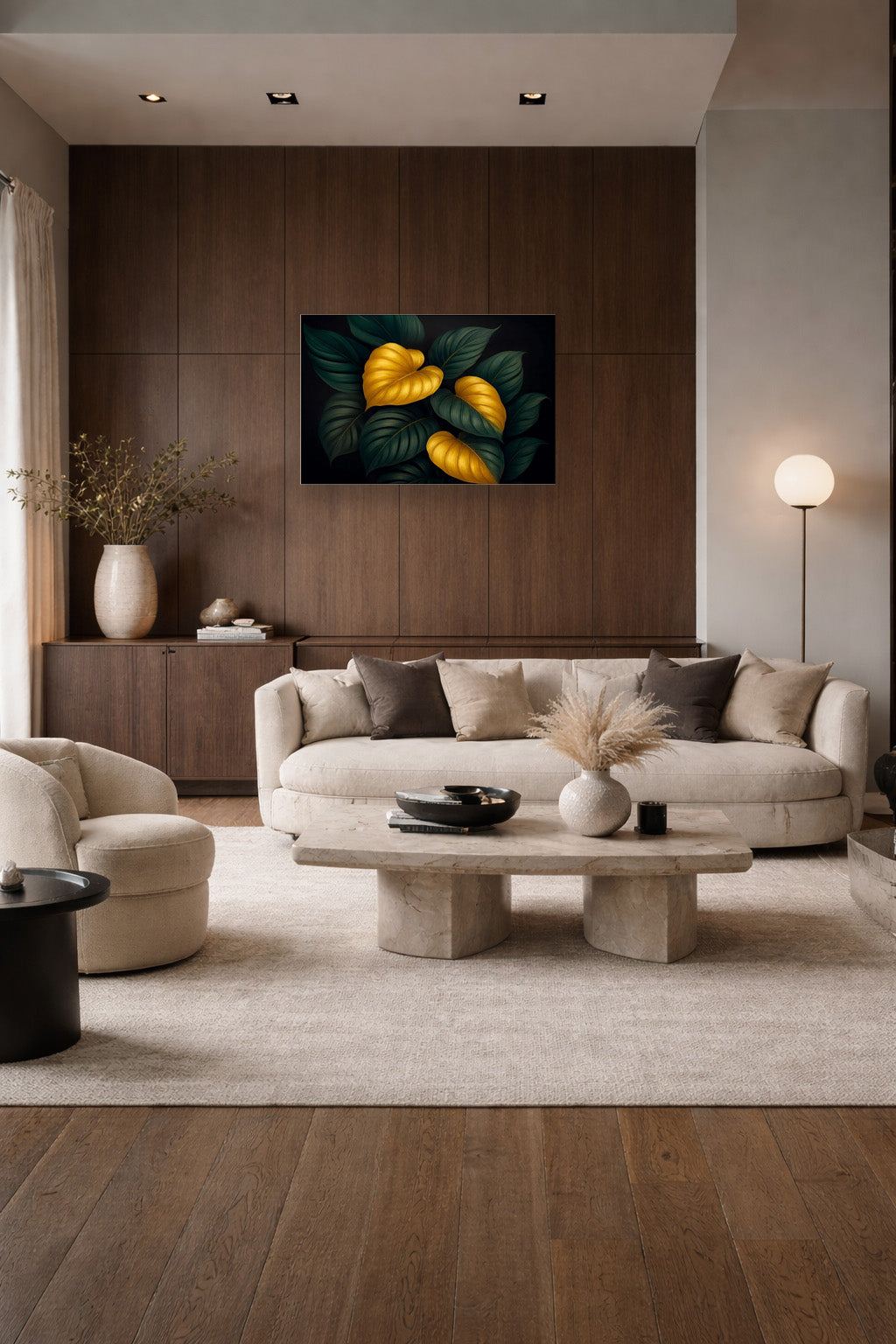 Luxury living room mockup featuring dark botanical wall art with golden leaves above a curved beige sofa in an elegant modern interior.