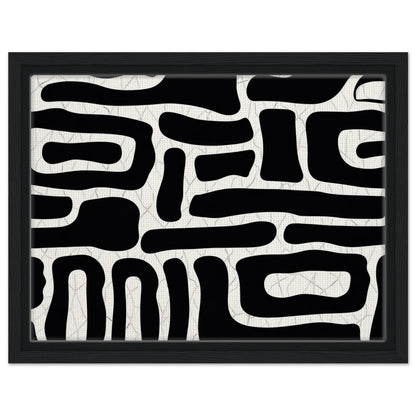 Modernist abstract print featuring irregular black and white forms in dark wood frame