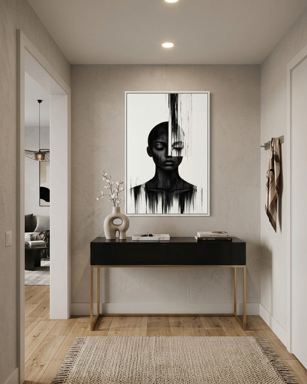 Molten Silhouette framed portrait above a console table in a hallway