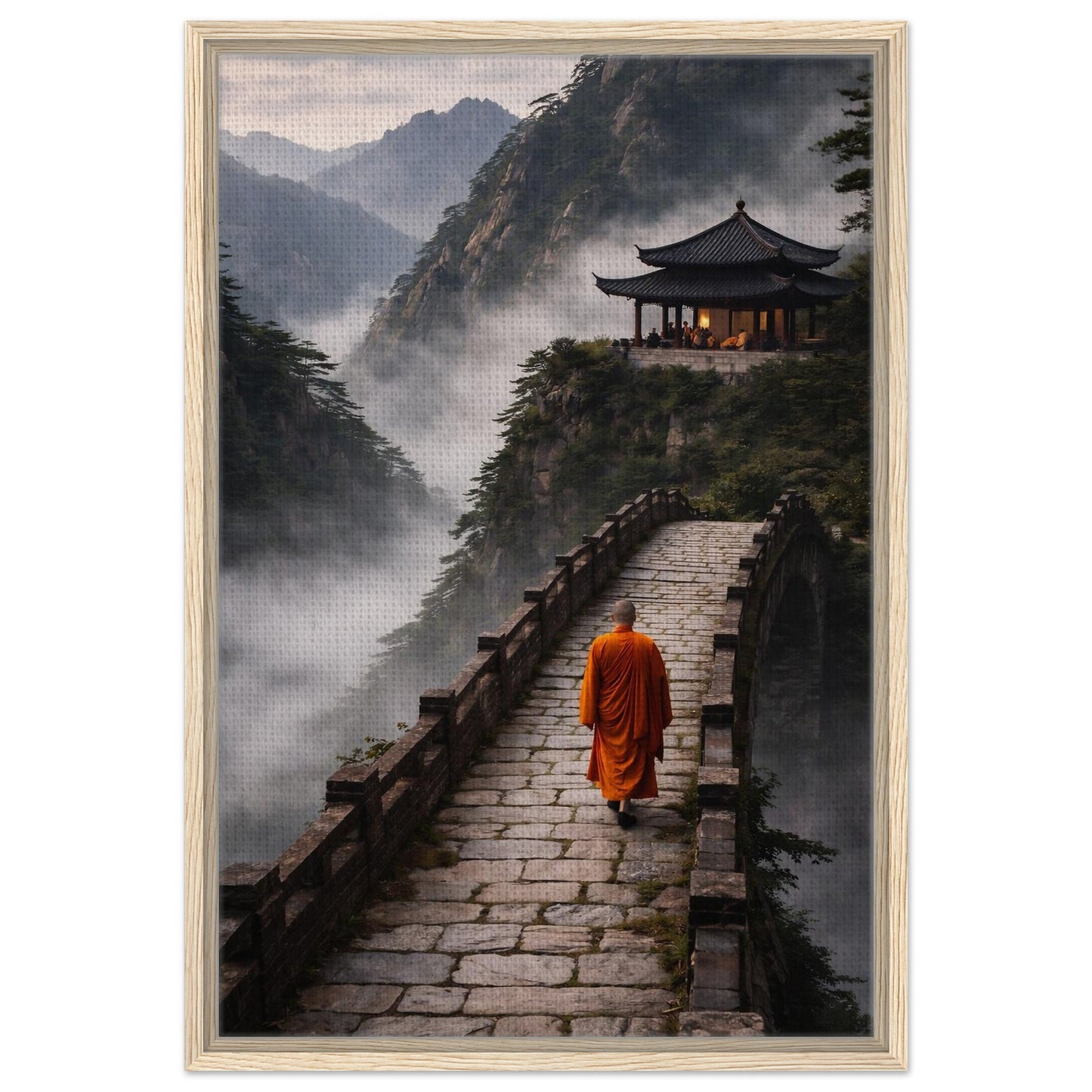 Serene monk and mountain temple canvas print with a blonde wood frame