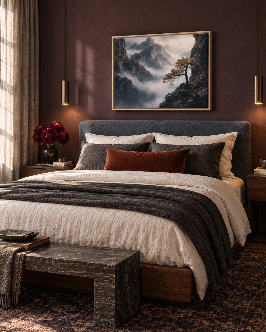 Moody mountain landscape wall art displayed above a bed in a warm modern bedroom