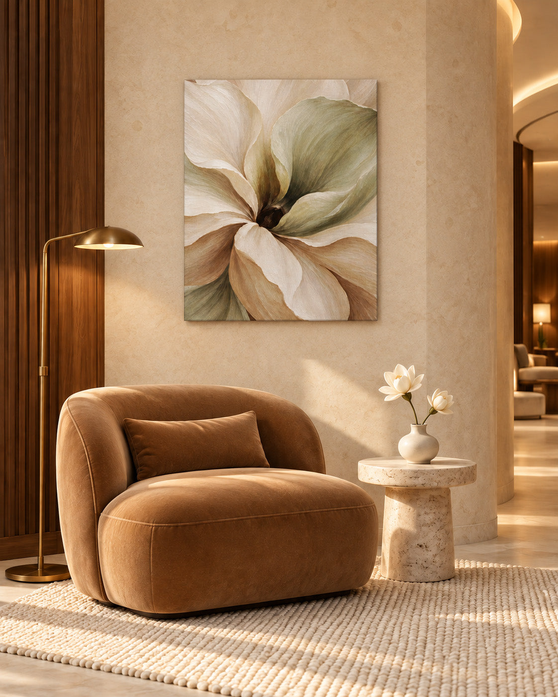 Muted Magnolia floral canvas above a caramel armchair beside a stone side table in a warm hotel lounge.