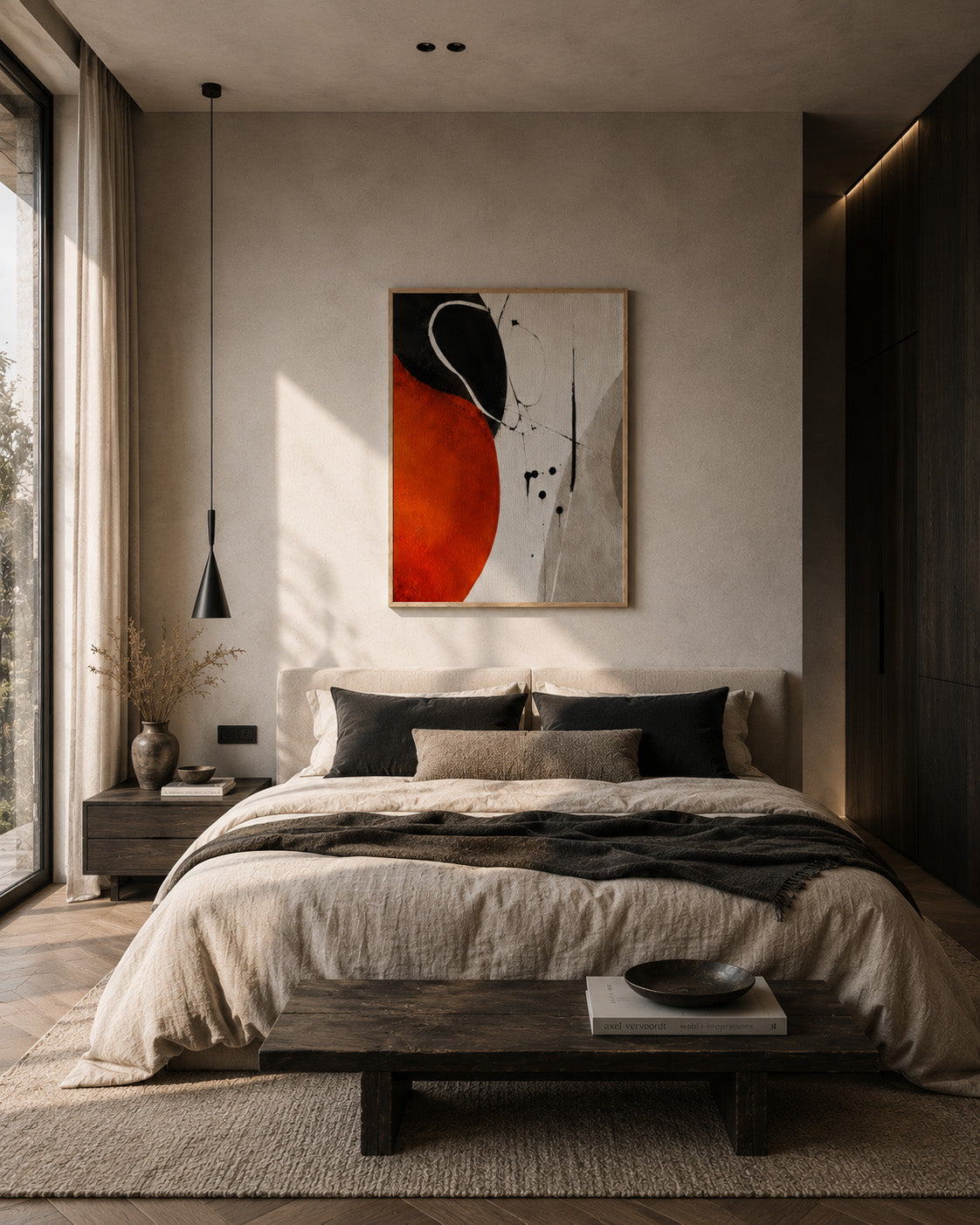 Orange and black abstract framed canvas wall art above bed in a modern neutral bedroom