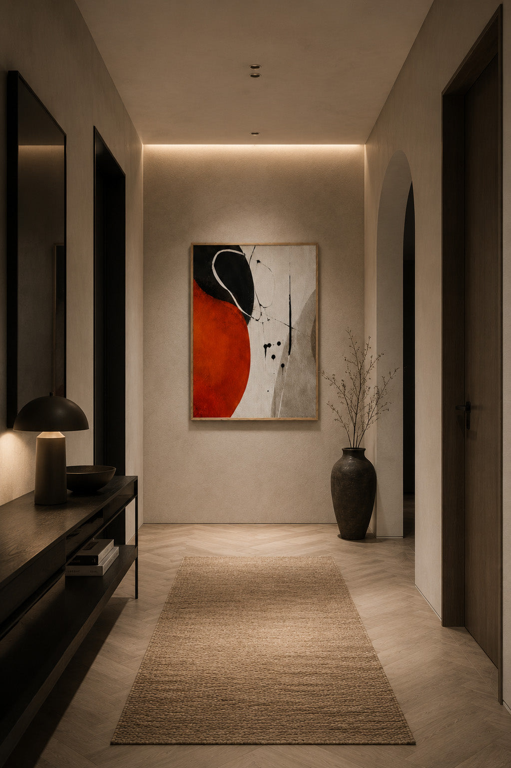 Orange and black abstract framed wall art displayed in a modern minimalist hallway