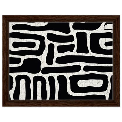 Organic geometric black and white artwork presented in a dark wood frame