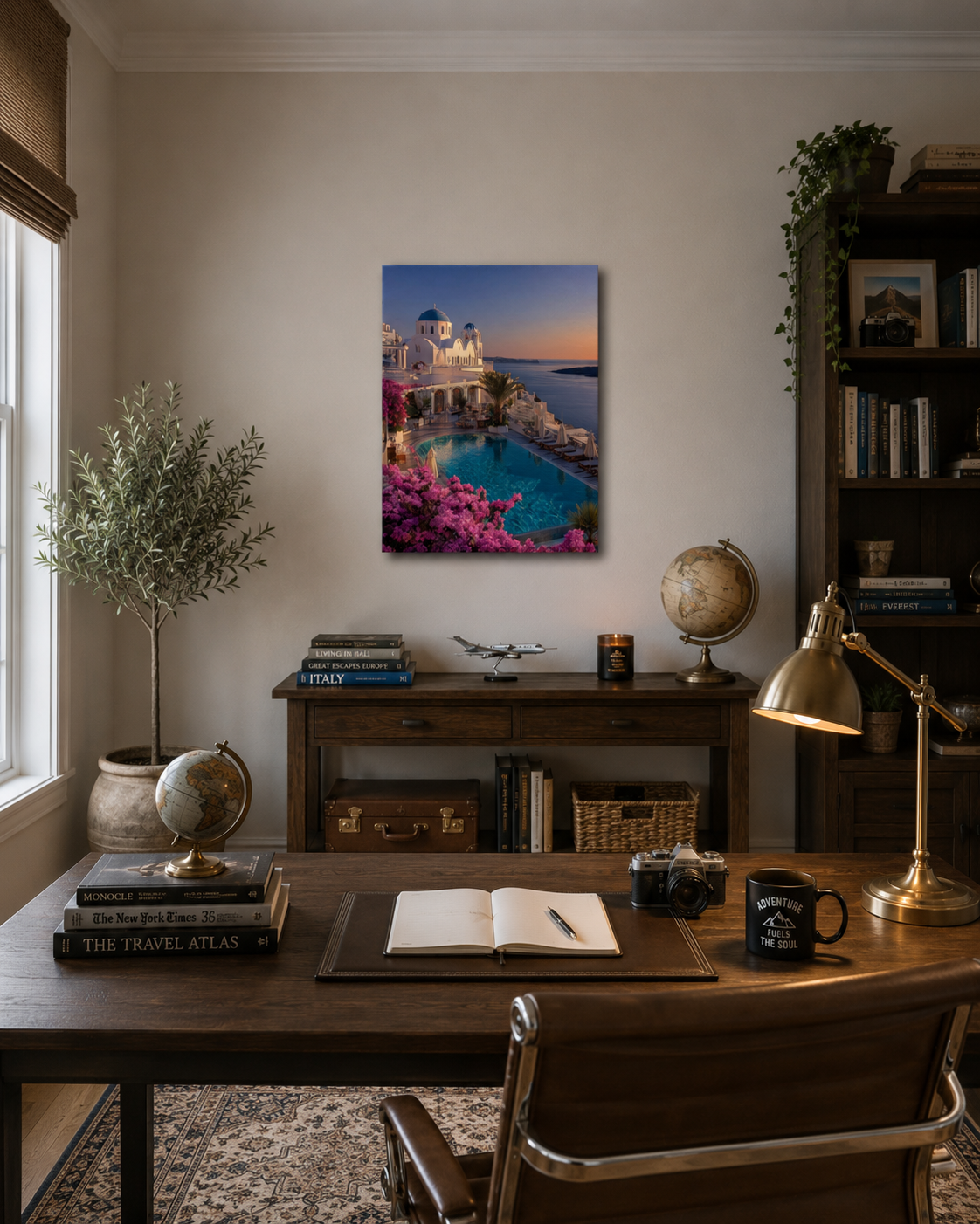 Santorini canvas print in a dark-walled study above a desk with a globe and bookshelves